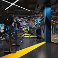 Modern Spacious Fitness Gym Interior With Blue Pillars Floor Markings And Training Equipment