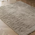 Natural Light Brown Square Rug With Woven Texture On Herringbone Wooden Floor