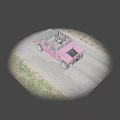 Pink Military Style Off Road Vehicle with Large Tires on Gravel Ground