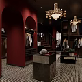 Elegant Clothing Store Interior With Red Walls Chandeliers Dark Shelves Mannequin Hanging Clothes