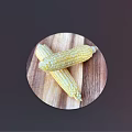 Fresh Two Sweet Corn Cobs Placed On Round Wooden Cutting Board