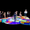 Vibrant Multicolored Art Installation With Geometric Platforms And People Interacting