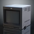 Vintage CRT Television With Gray Body Control Buttons And Ventilation Grilles On Smooth Surface
