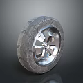 Car Tire With Silver Metallic Wheel Rim And Textured Tread Close-up View