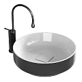 Modern Round Ceramic Wash Basin with Black Faucet and Elegant Bathroom Decor Design