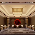 Hotel Public Lounge with Chandelier Red Artwork Comfortable Seating and Columns