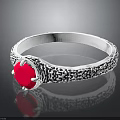 Intricate Silver Bracelet With Black Decorative Patterns And Red Central Stone
