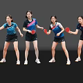 Four Women in Sportswear Holding Table Tennis Rackets Striking Dynamic Hitting Poses Against Black Background