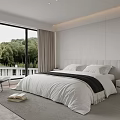 Modern Bedroom Interior With White Bedding Black Throw Blanket And Floor to Ceiling Windows