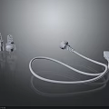 White Electrical Plugs Sockets And Power Cable On Dark Reflective Background