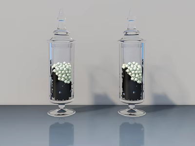 Two Transparent Ceramic Vessels With White Spherical Objects And Black Base On Grey Countertop 3d model