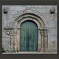 Medieval Stone Entrance Gate With Green Wooden Door And Arched Carved Details