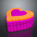 Heart Shaped Cake With Orange Top Purple Center And Pink Heart Pattern Base