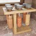 Wooden Spice Jar Rack With Gray Lids And Transparent Containers On Kitchen Countertop
