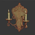 Vintage Style Golden Wall Sconce With Double Candle Holders And Curved Scroll Patterns