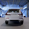 White Volvo SUV With Modern Design And Black Wheels In Spacious Industrial Hall