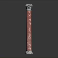 Two Red Marble Roman Columns With Ornate Carved Capitals And Classic Design
