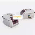 Two Modern Digital Rice Cookers With Stainless Steel Body For Home Kitchen Use
