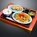 Traditional Asian Food Platter with Dumplings Noodles Rice and Sauce on Wooden Tray