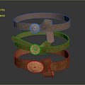 Brown Leather Belts With Intricate Embossed Patterns And Round Decorative Buckles