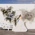 Wedding Photo Check in Spot With White Backdrop Floral Decor Gray Gauze And Step Seats