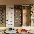Kids Indoor Play Area With Climbing Wall Colorful Grips Rope Net And Round Mats