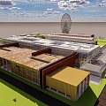 Modern Industrial Park With Various Buildings Different Colored Roofs Green Lawns And Distant Ferris Wheel