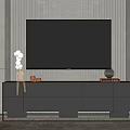 Elegant Modern Black TV Stand With Gold Accents Drawers And Decorative Sculptures On Striped Wall