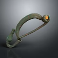 Ancient Bronze Fibula Sculpture With Green Patina And Inlaid Gemstone