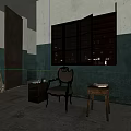 Dark Accent Chair with Blue White Walls Worn Areas Concrete Floor and Small Table