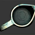 Handcrafted Turquoise Ceramic Cup With Textured Surface And Unique Design On Dark Background
