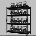 Black Metal Multi Tiered Shelving Unit With Silver Kettlebells On Each Tier