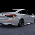 Silver Sporty Sedan Featuring Custom Wheels Modern Front Fascia And Sleek Design