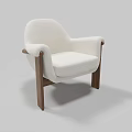 Modern White Upholstered Armchair With Wooden Armrests And Legs And Curved Backrest