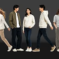 Group of People Walking Together in Casual Outfits on Dark Background
