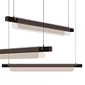 Modern Linear Chandeliers with Ribbed Metallic Bodies and Black Suspension Brackets