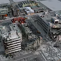 Aerial View of Urban Area With Collapsed Building Structures and Debris