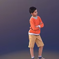 Young Boy In Orange Sweater With White Cuffs And Khaki Shorts Standing With Arms Crossed