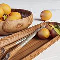 Wood Grain Ceramic Vessels Bowls Plates Trays On White Wooden Tabletop With Yellow Fruits