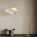 Modern Golden Arched Floor Lamp With White Lampshade And Black Side Table In Interior