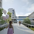 Bright Modern Office Building Exterior With Green Trees Walkway And People Holding Balloons