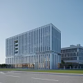 Modern Multi Storey Office Building With White Exterior Large Glass Windows And Green Lawn Trees