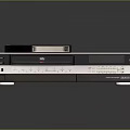 Silver VHS Video Recorder With Classic VHS Tape Placed On Top Surface