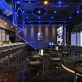 Stylish Modern Bar Interior With Blue Lighting Bar Counter And Leather Seats