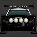 Redline Racing Car With Rear Spoiler Number 77 Front Round Headlights And Black White Body