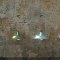 Stylish Modern Pendant Lights In Various Colors Hanging On Dark Textured Wall
