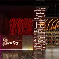 Neon Lit Baby Face Bar Interior With Red Decorative Letters And Liquor Shelves