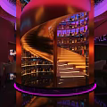Stylish Modern Bar Lounge Interior With Illuminated Wine Racks And Plush Sofa