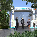 People Gathered At Modern Outdoor Tech Archway With Greenery And Trees