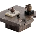 Wooden Coffee Table with Book Clay Pot Small Cups and Decorative Ornament on Black Base
